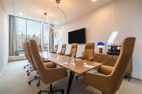 Meeting room with large brown executive chairs NH collection Copenhagen